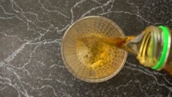 Apple or Grape Light Fresh Juice Poured in the Glass