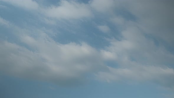 4K Sky Time lapse, Beautiful background, Sky Timelapse of skyscrapers. alt