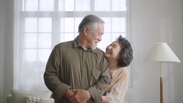 Asian senior couple smiling at the camera. Family mature couple portrait alt