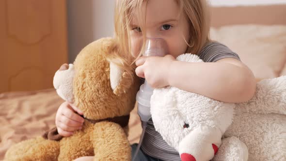 Little Girl Threeyearold Uses Nebulizer Inhaler Breathes Medicine alt