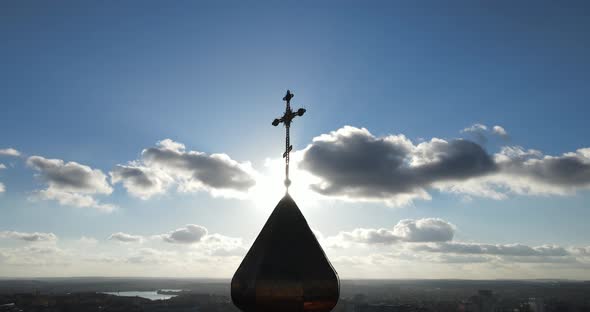 The Church Cross Rises Above The City