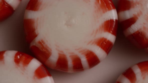 Rotating shot of peppermint candies - CANDY PEPPERMINT 024 alt