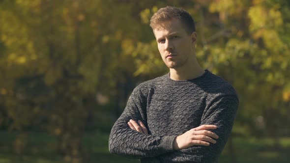 Worried Man Nervously Looking at Camera alt