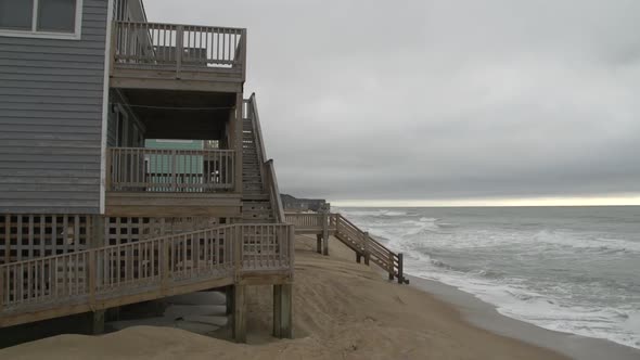 Beach houses facing shifting sands in North Carolina alt