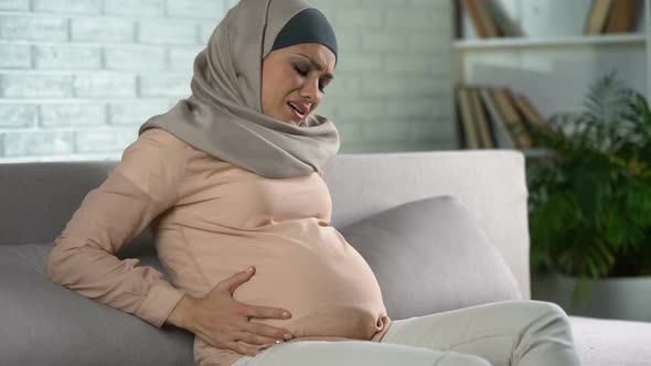 Worried Mother-To-Be Feeling Belly Pain, Abdominal Discomfort, Prenatal Care alt