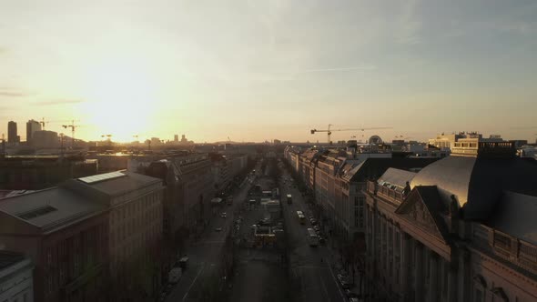 AERIAL: Spectacular Low Flight Through Busy Berlin, Germany Street Towards Brandenburg Gate in alt