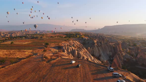 Scenic Landscape With Air Balloons In The Sky alt