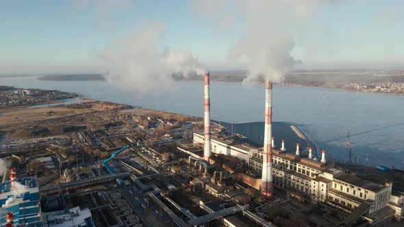 Industrial factory pipes emission carbon gases in atmosphere alt