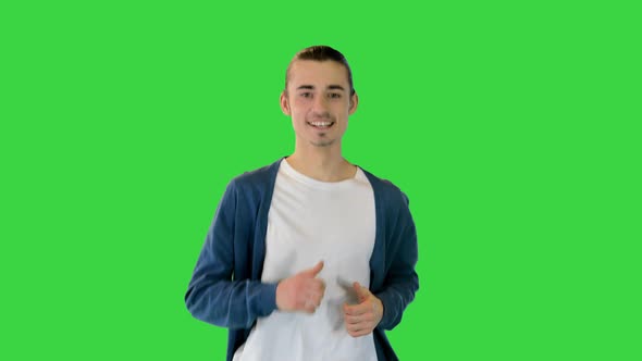 Young White Man Runs Smiling on a Green Screen Chroma Key