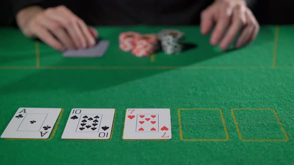 Gamer Person Playing Poker in Casino alt