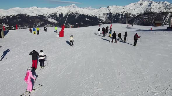 Aerial View of the Alps Mountains in France. Mountain Tops Covered in Snow. Alpine Ski Facilities