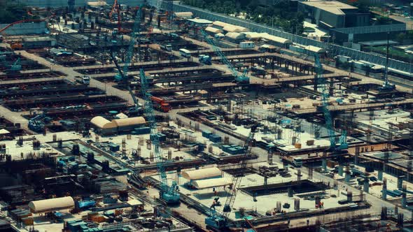 Large Construction Site with Heavy Construction Machinery in Metropolis alt