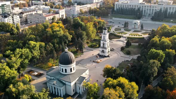 Aerial drone view of Chisinau downtown at sunset. View of central park alt