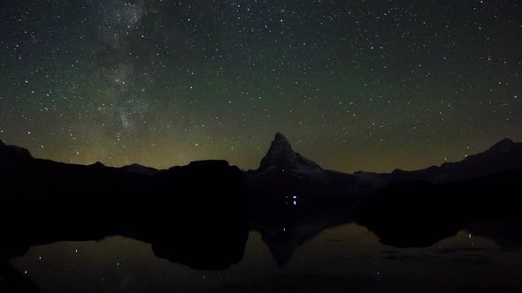 Time Lapse Milkyway Moving over Matterhorn Mountain in Swiss Alps
