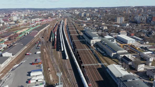 AERIAL: Panorama of Train Railroad in Vilnius with Tracks and Buildings