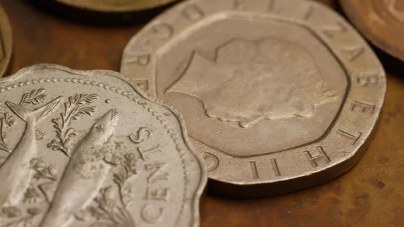 Rotating stock footage shot of international monetary coins - MONEY 0361 alt