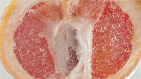 Grapefruit Closeup Sizzles or Floats to the Surface