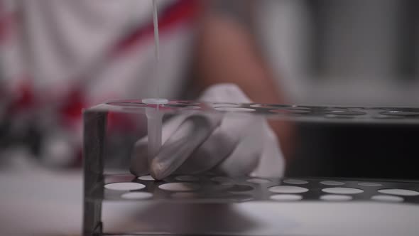 antigen test kit with a COVID-19 2019-nCoV viral disease test kit, people at home performing rapid alt