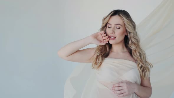 Excited Sensual Gorgeous Pregnant Young Lady with Maternity Tummy alt