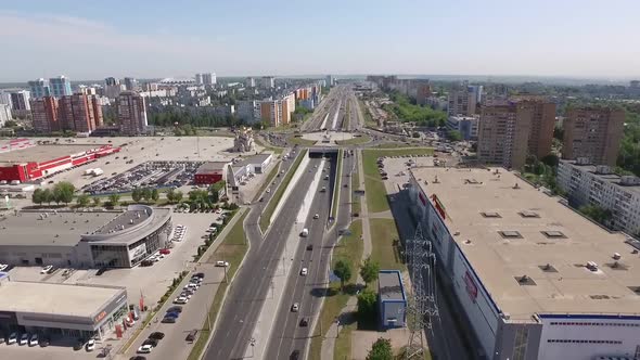 Road Interjunction, Living Houses and Shopping Malls in Modern Town, Aerial View