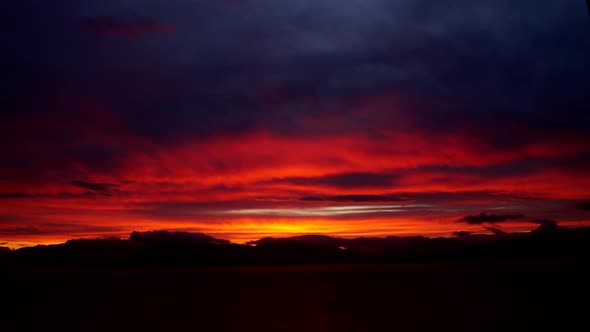 A Fiery Sunset Behind The Hills Of Argyll.