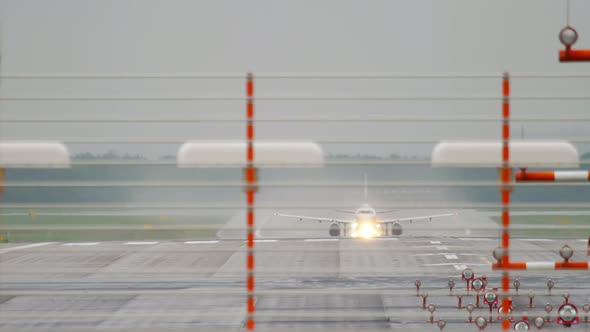 Airplane Departure at Rainy Weather alt