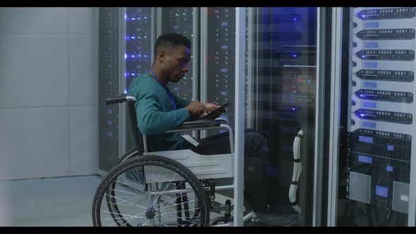 Technician Working in Data Center alt