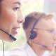 Diverse team of young professionals is working in the phone support office. - VideoHive Item for Sale