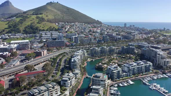 Cape Town marina district at noon, camera tracking to the right