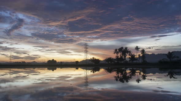 Timelapse beautiful sunrise over the electric tower power line alt