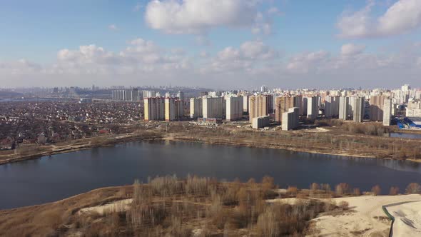 Aerial View of Beautiful Skyscrapers Near the Lake In Early Spring