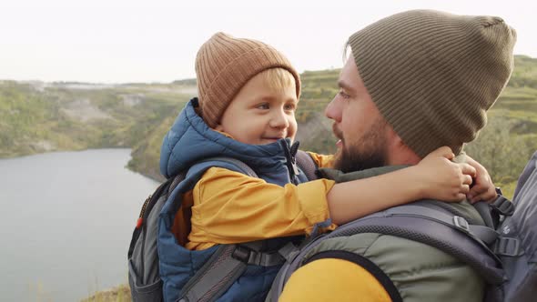 Father and Little Boy on Hike alt