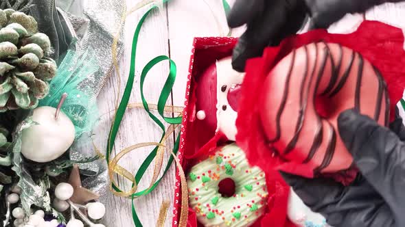 donut with icing and sprinkling close-up, christmas sweets
