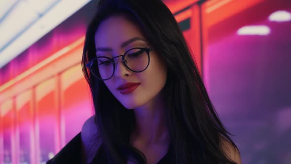 Asian Woman in the City at Night alt