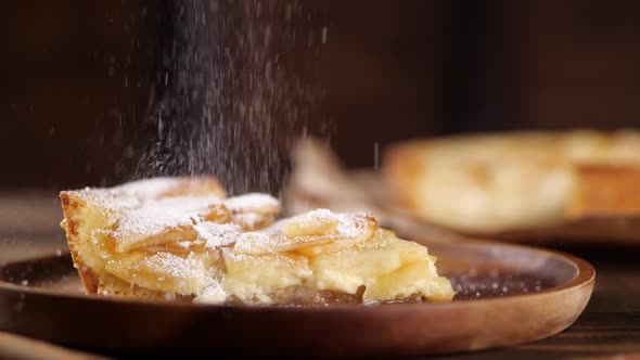 Powdered Sugar Falling on Slice of Tart