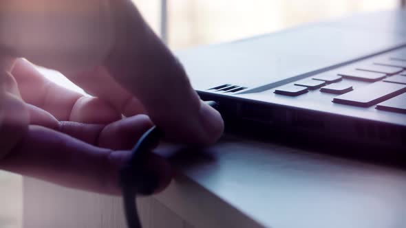 Hand Connecting USB Cable Computer Laptop. Power Delivery Type-C Cable For Battery Charging Notebook alt