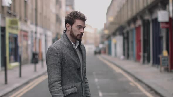 Portrait of male in street looking to camera, London, England