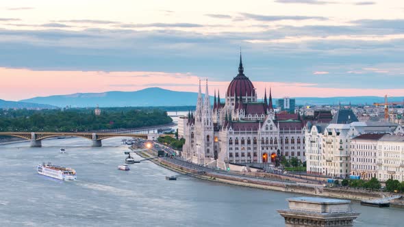 Budapest with Parliament building and Danube river at sunset alt