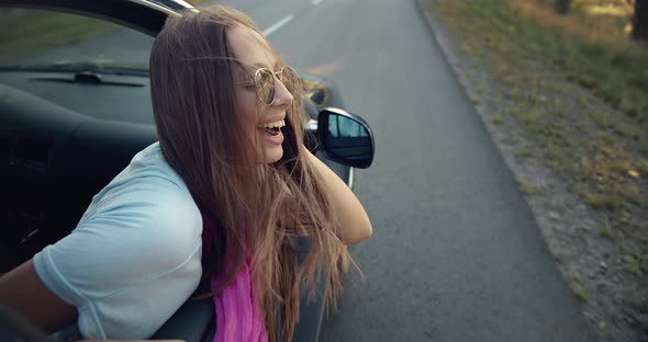 Woman in Car Window