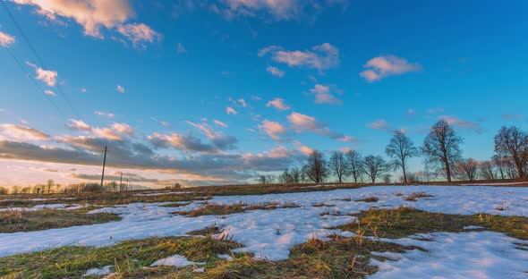 Spring Plowed Field Partly Covered Winter Melting Snow Ready For New Season alt