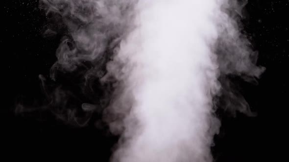 Water Vapor. White Jet of Vapour Steam on Black Background. Slow Motion alt