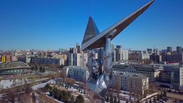 Amazing Monument of Glory Steel Human with Symbol in Hands Aerial Closeup View