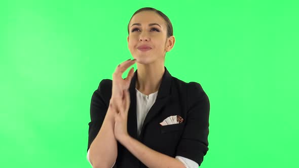 Lovely Girl Daydreaming and Smiling Looking Up. Green Screen alt