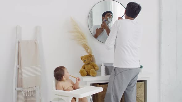 Single Father Shaving in Morning alt