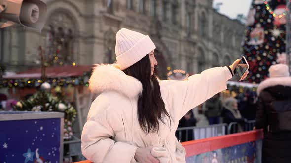 Christmas Ice Rink with a Brunette Girl