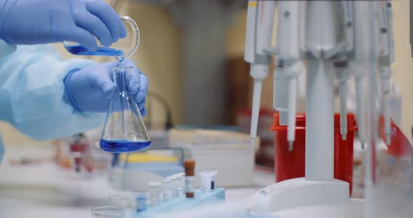 Scientist Working on Virus Cure at Laboratory alt