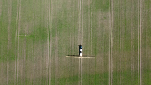 Processing of Agricultural Fields with Fertilizers and Pesticides From Weeds and Pests