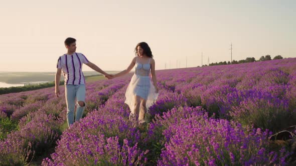 A Couple in Love Walks on a Lavender Field