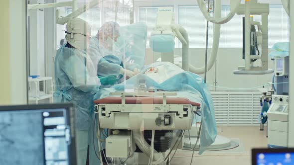 Cardiovascular Surgery Behind Glass Wall alt