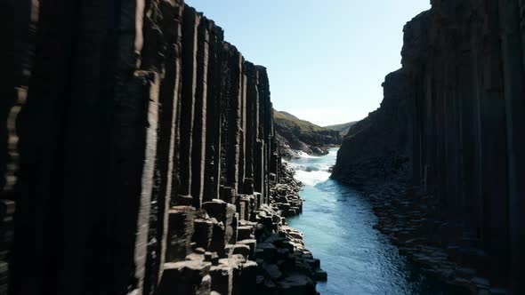 Drone View of Majestic Canyon with Volcanic Basalt Columns in Iceland and Glacier Water River alt